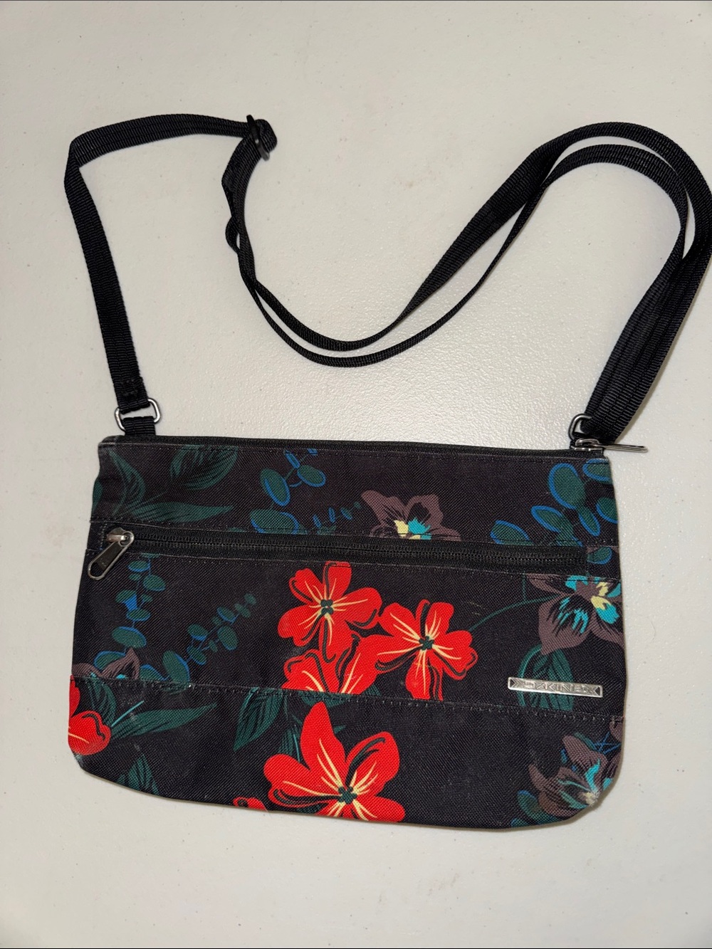 Dakine Black Crossbody Bag with Red Floral Print